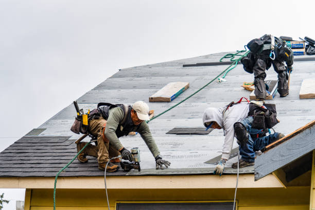 Professional Roof Replacement technician working in Nahant, MA